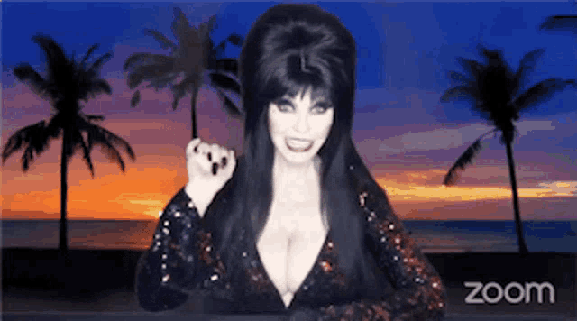 a woman with long black hair is standing in front of a zoom screen