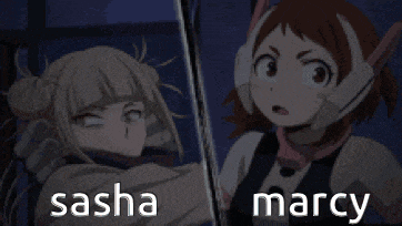 sasha and marcy are standing next to each other in a dark room