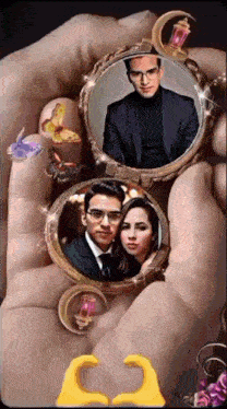 a person is holding a locket with two pictures of a man and woman inside of it
