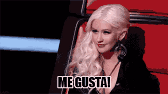 a woman sitting in a chair with me gusta written on the bottom