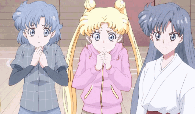 three anime characters are standing next to each other