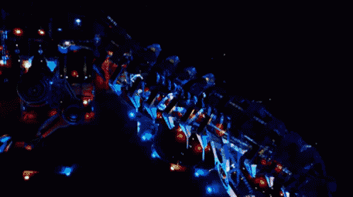 a blurry picture of a monster with a few lines of light coming out of its mouth