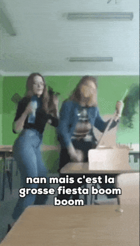 two girls are dancing in a room with the words nan mais c 'est la grosse fiesta boom boom