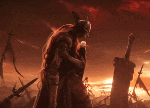 a man with long red hair is standing in front of a sword