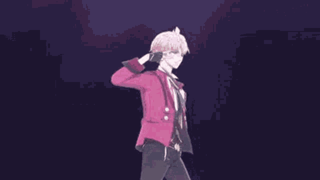 a boy in a pink jacket and black pants is dancing on a stage .