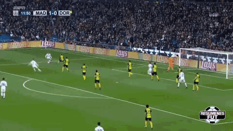 a soccer game is being played on a field with advertisements for lays on the sidelines