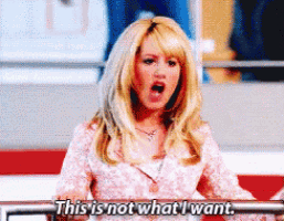 a woman in a pink dress is saying this is not what i want .