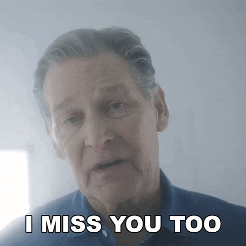 an older man says " i miss you too " in front of a mirror