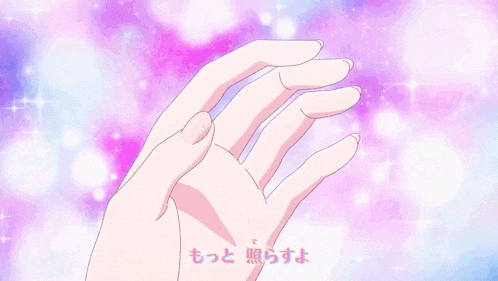 a person is holding a pink bow with hearts on it in their hands
