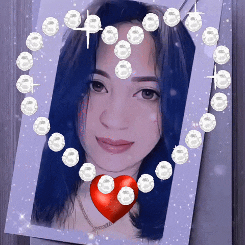 a picture of a woman with blue hair and pearls around her