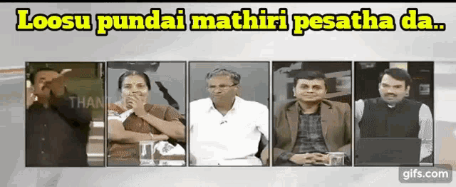 a group of people sitting in front of a sign that says loosu pundai mathir pesatha da