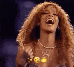 a woman with curly hair is laughing with her mouth open while wearing a necklace .