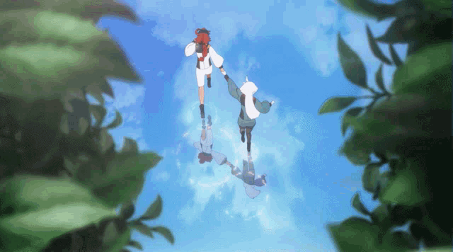 a couple of people holding hands in the air
