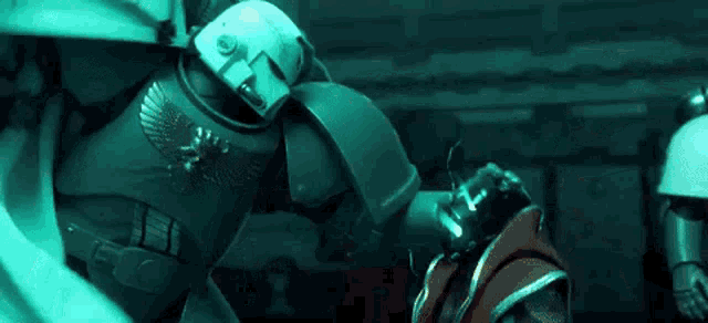 a robot is standing next to another robot in a dark room .