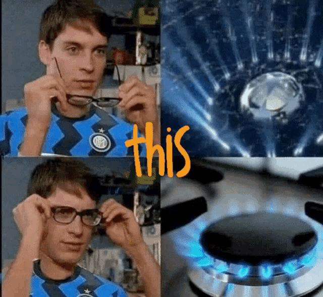 a man wearing glasses and a blue shirt with the word this on the bottom right