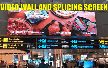 a video wall and splicing screen displays a menu for the kitchen by wolfgang puck and hudson 's coffee