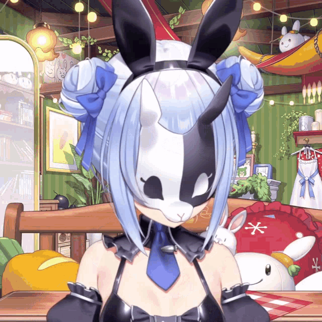 a girl with bunny ears and a mask on her head