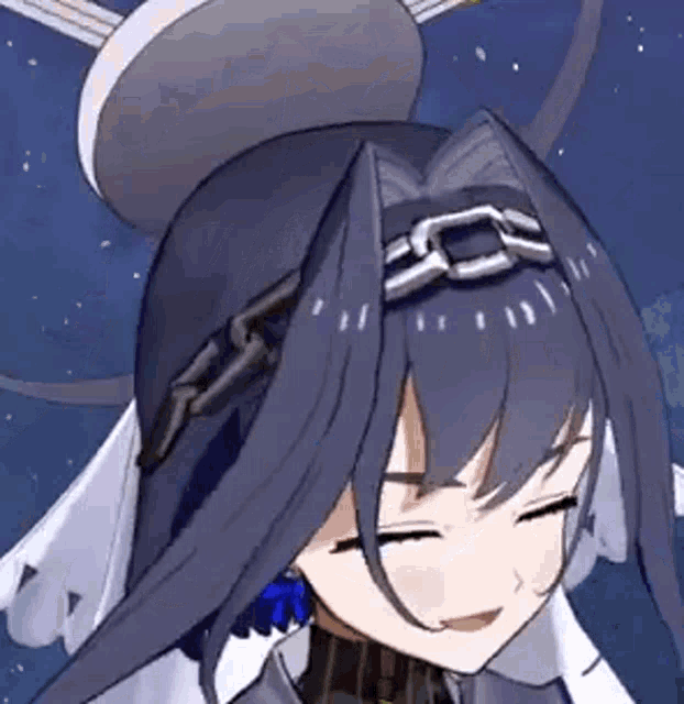 a close up of a person 's face with their eyes closed and a crown on their head .