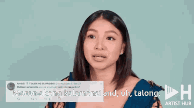 a woman is talking in front of a twitter post that says meron akong kalamani and uh talong
