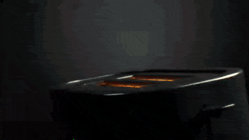 a piece of toast is being toasted in a toaster oven