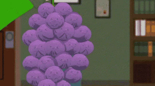 a bunch of purple balls with faces on them and the words " member ghostbusters oh "