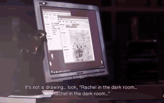 a computer monitor with the words " it 's not a drawing look rachel in the dark room rachel in the dark room " on it