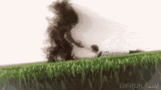 a gif from gifrun.com shows a monster attacking a child