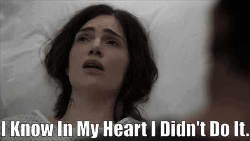 a woman laying in a hospital bed with the words " i know in my heart i did n't do it " below her