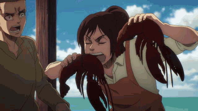 a woman in an apron is holding a large lobster in her hands