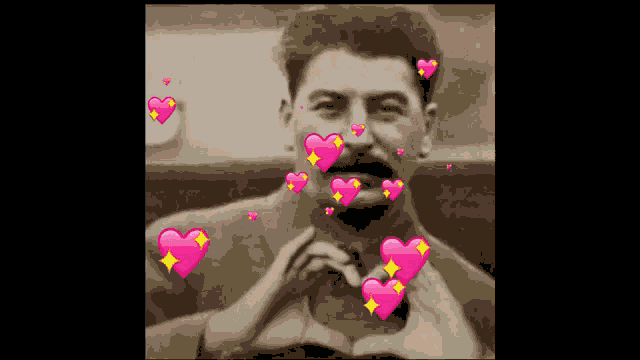 a man is surrounded by pink hearts on his face