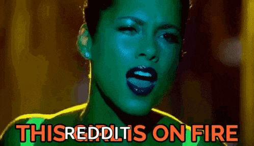 a close up of a woman 's face with the words `` this reddit 's on fire '' written on it .