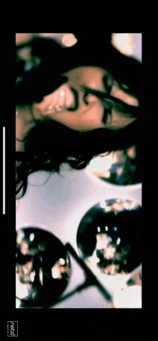 a picture of a woman with the word polaroid on the bottom right