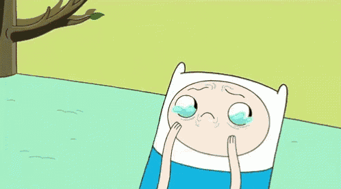 a cartoon character from adventure time is crying with tears coming out of his eyes .