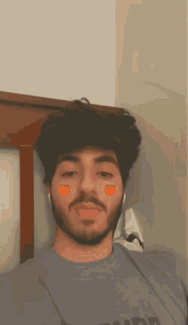 a man with a beard is wearing a t-shirt that says tiger on it