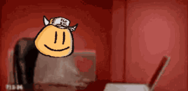 a drawing of a smiley face with horns and a hat that says top dog on it
