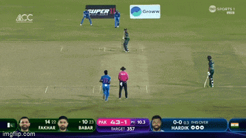 a cricket game is being shown on a screen with a groww ad in the background