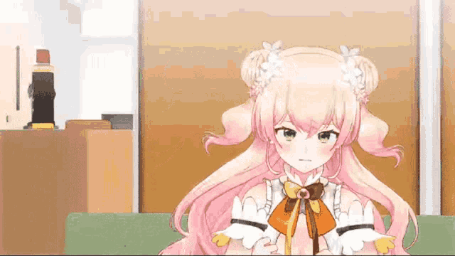 a pink haired anime girl is sitting on a couch with a bottle of glue in the background .