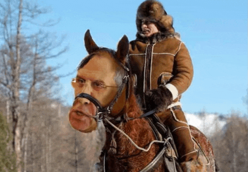 a man riding a horse with a man 's face on the back
