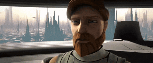 a man with a beard is looking out of a window