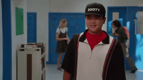 That Moment When You Realize Your Hat Says "Booty" GIF - Eddie Huang Smile Fresh Off The Boat GIFs