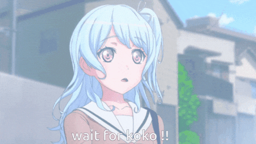 a blue haired anime girl with the words wait for koko written below her