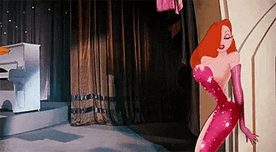 a woman in a pink dress and gloves is standing in a room .