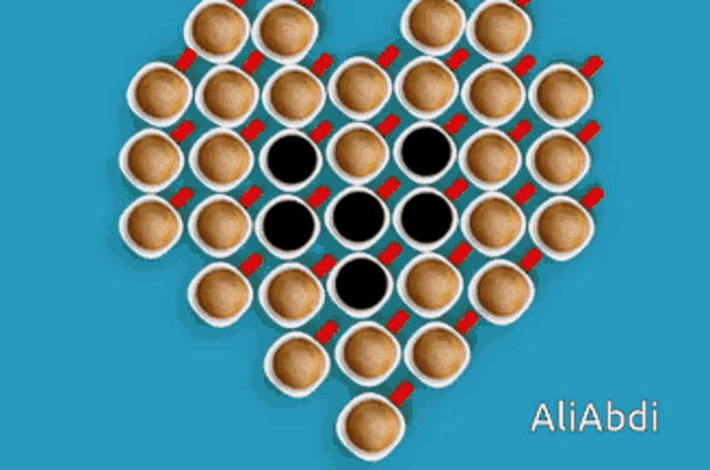 coffee cups arranged in the shape of a heart with aliabdi written on the bottom