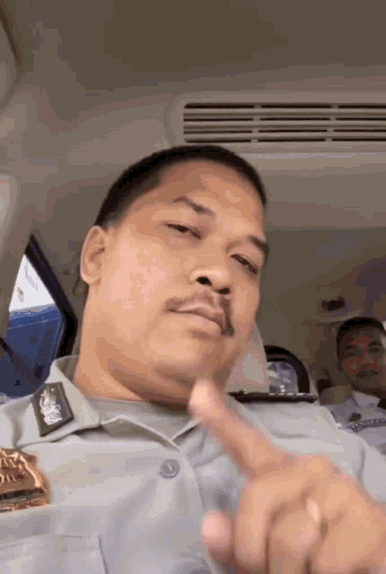 a man in a military uniform with a badge that says ' army ' on it