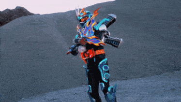 a person in a superhero costume is standing on a dirt field with their arms outstretched