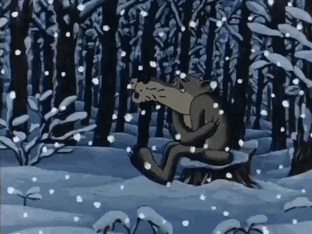 a couple of bears sitting on a tree stump in a snowy forest