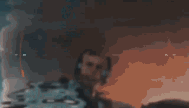 a close up of a person 's face with a blurred background that says ' a ' on it .