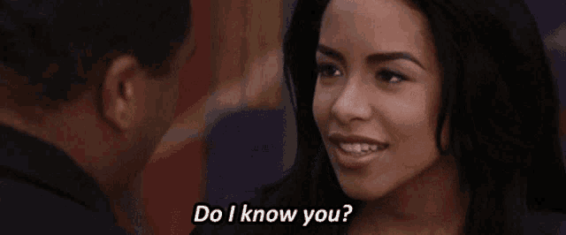 a man and a woman are looking at each other and the woman says do i know you .