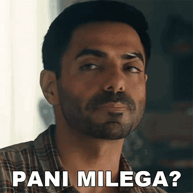 a man with a beard and a plaid shirt is asking pani milega