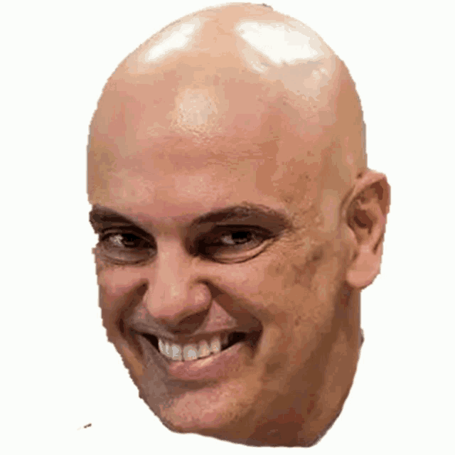 a bald man is smiling with his mouth open